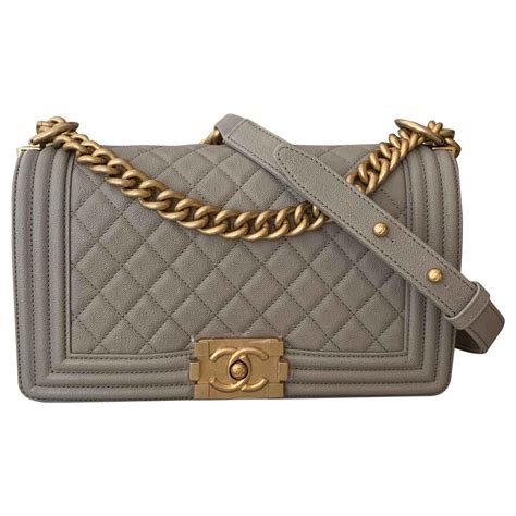 gray chanel boy bag|Chanel shoulder bag with chain.